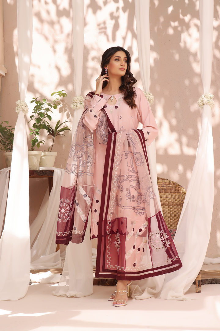  Experience timeless elegance with our Cotton Net Shirt and Pants/Palazzo set, perfectly paired with a Pure Organza Dupatta. 