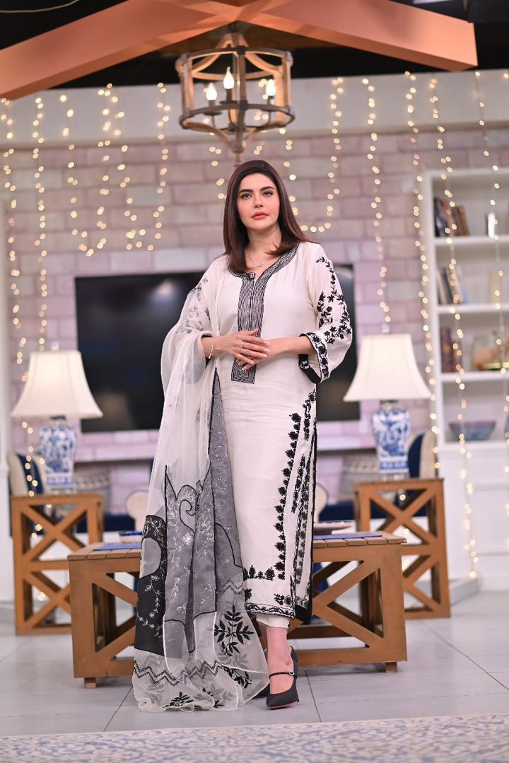  Explore the enchanting Noor e Nazar collection, crafted from pure sheesha silk with intricate embroidery and delicate detailing for a truly timeless look.