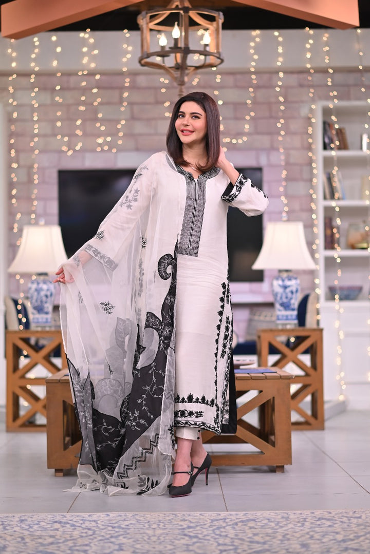 Explore the enchanting Noor e Nazar collection, crafted from pure sheesha silk with intricate embroidery and delicate detailing for a truly timeless look.